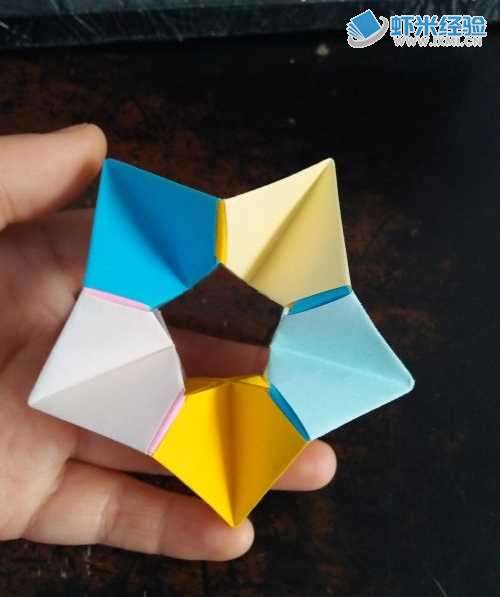 _折镂空五角星的步骤和视频_镂空五角星折纸